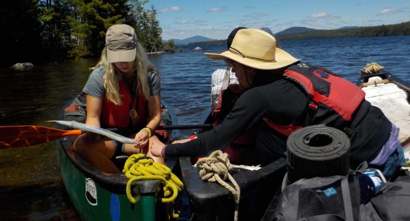 teens learn canoeing skills